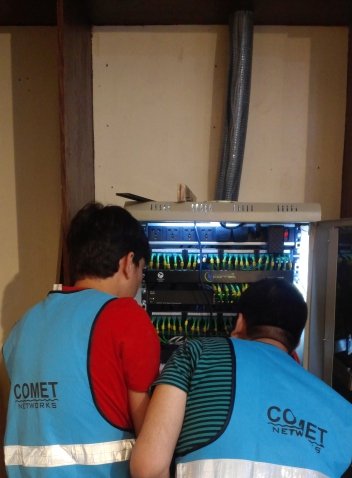 Comet Networks technician working on structured cabling